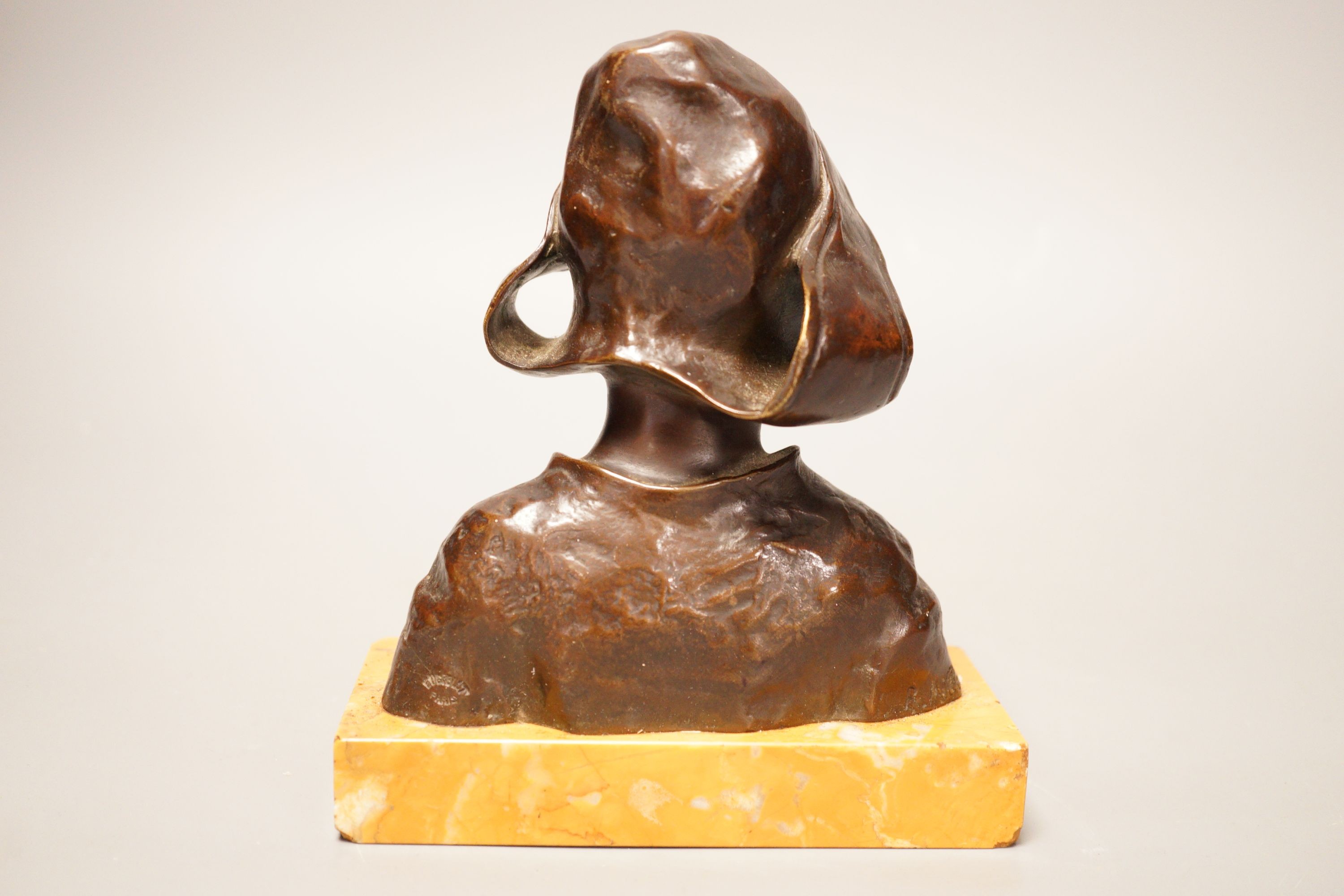 R. Mille (?) a small shoulder length bronze bust, study of a Dutch girl, 17cm tall